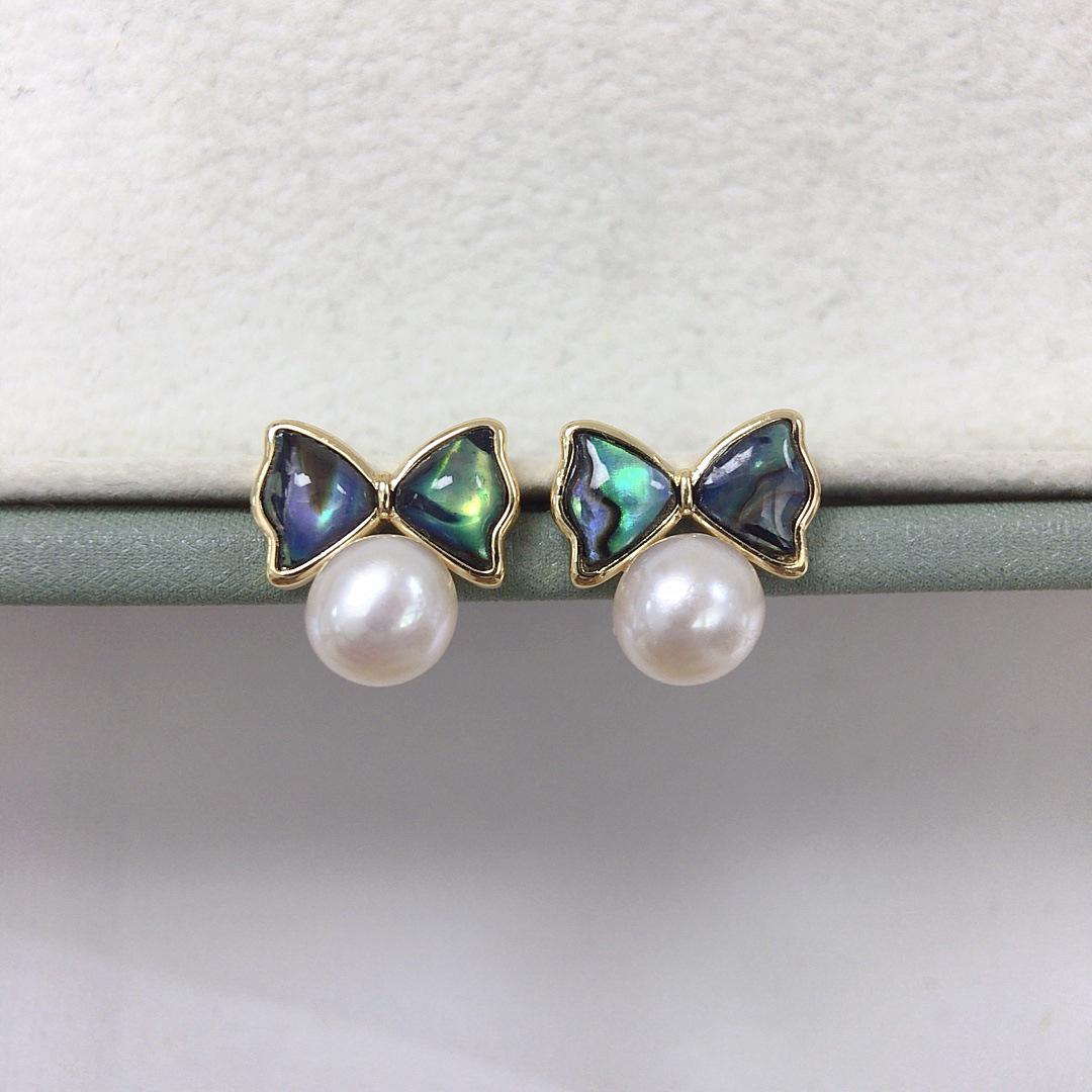 

Zhuji Freshwater Pearl Stud Earrings with Abalone Shell and Bowknot Design