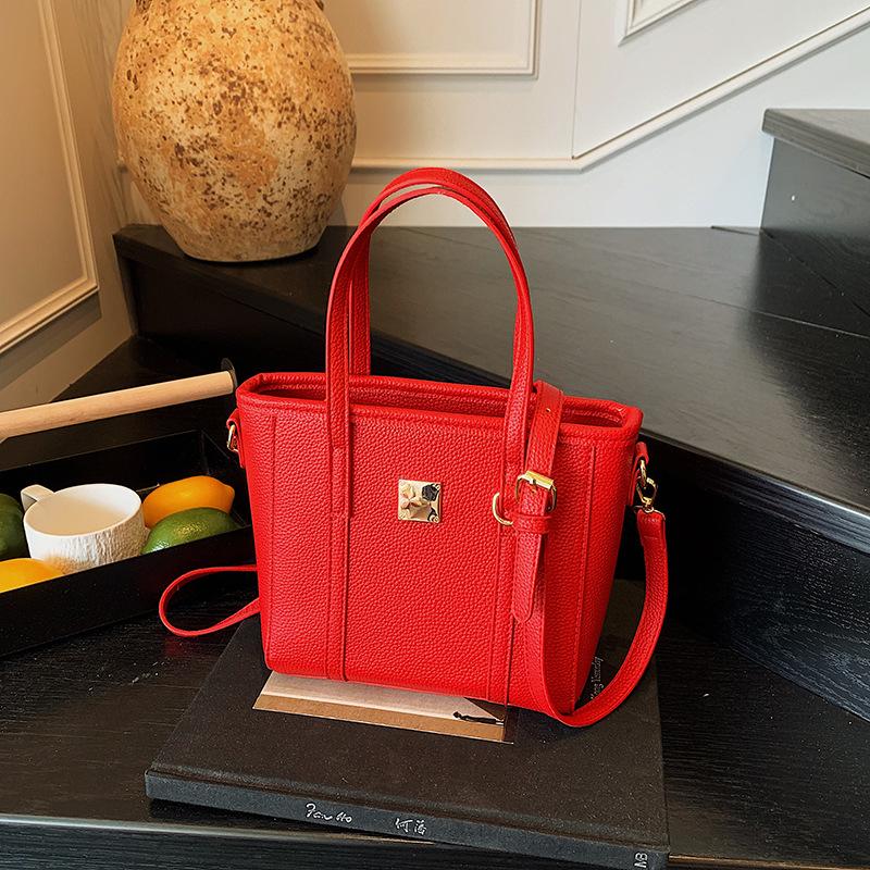 

Высококачественная нишевая модная и простая ветрозащитная портативная сумка-ведро женская однотонная универсальная повседневная сумка-мессенджер красный