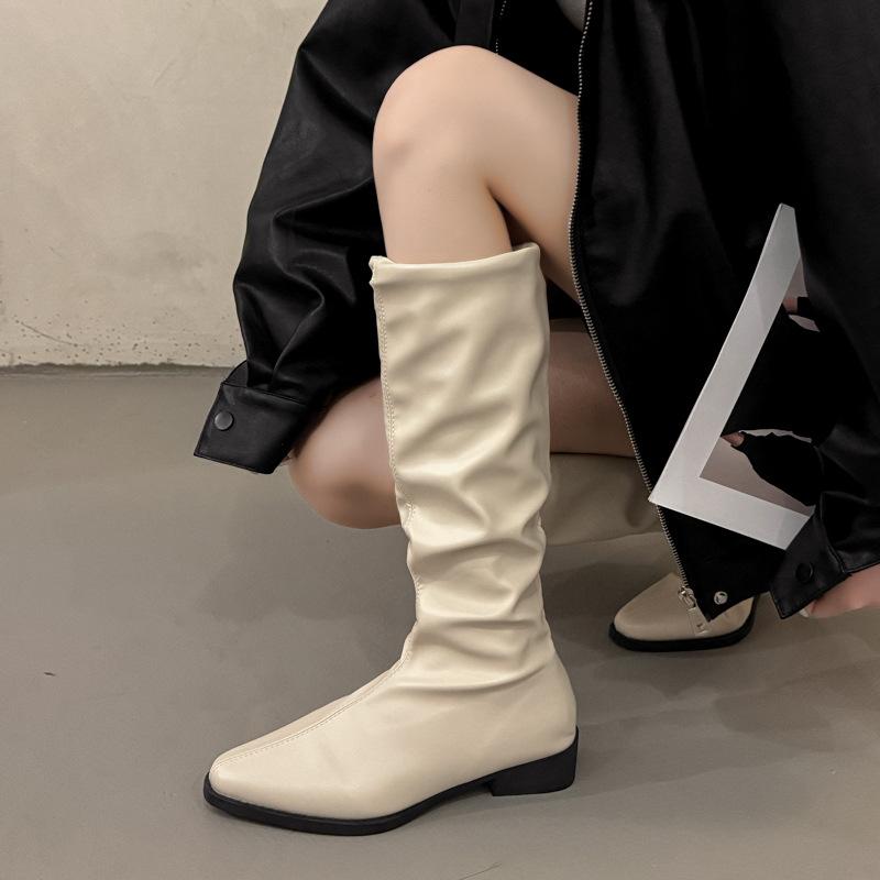 Pile boots women's boots 2025 new spring and autumn retro but knee thin solid color thick heel knight boots