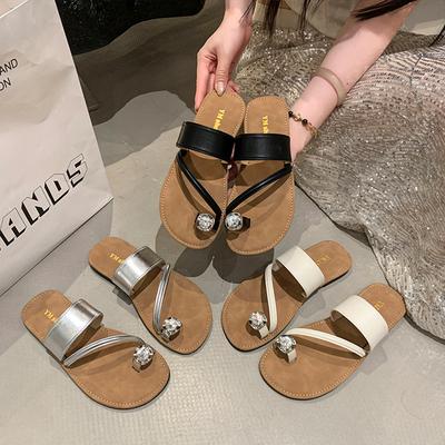 Strass-Zehensteg-Strandsandalen 2025 Sommer neue High-End-Mode flachsohlige Pantoletten Damen Ein-Wort-Pantoletten