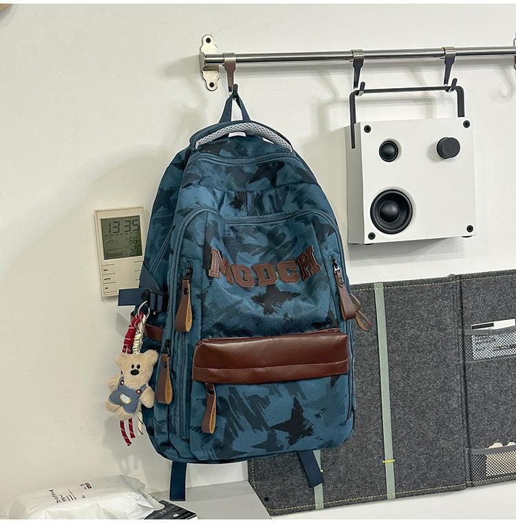 Schoolbag new street feel cool niche camouflage backpack junior high school students class holiday play to reduce the burden leisure bag