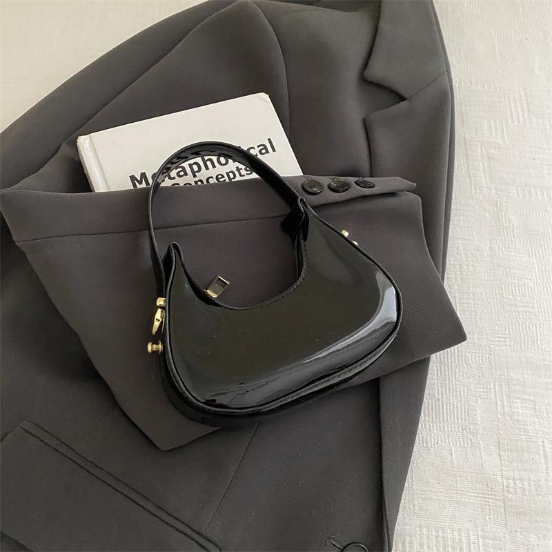 Höst nisch enfärgad bärbar halvmåneväska ny trendig avslappnad textur fashionabel axel armhåleväska