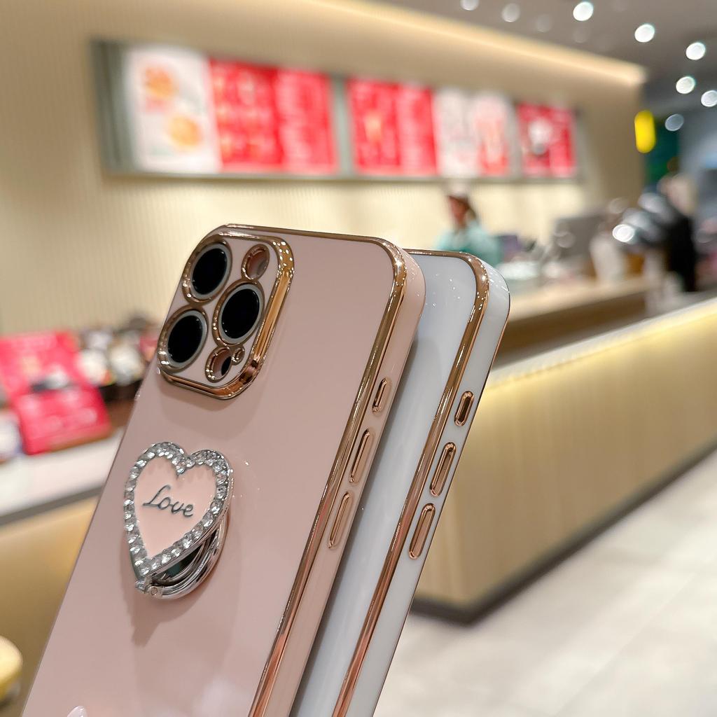 Luxury Wrist Strap Love Heart Stand Plating Camera Lens Protect Bumper Phone Case For iPhone 17 Air 16 15 14 Plus 13 12 11 Pro Max SE Girls Cute Cover