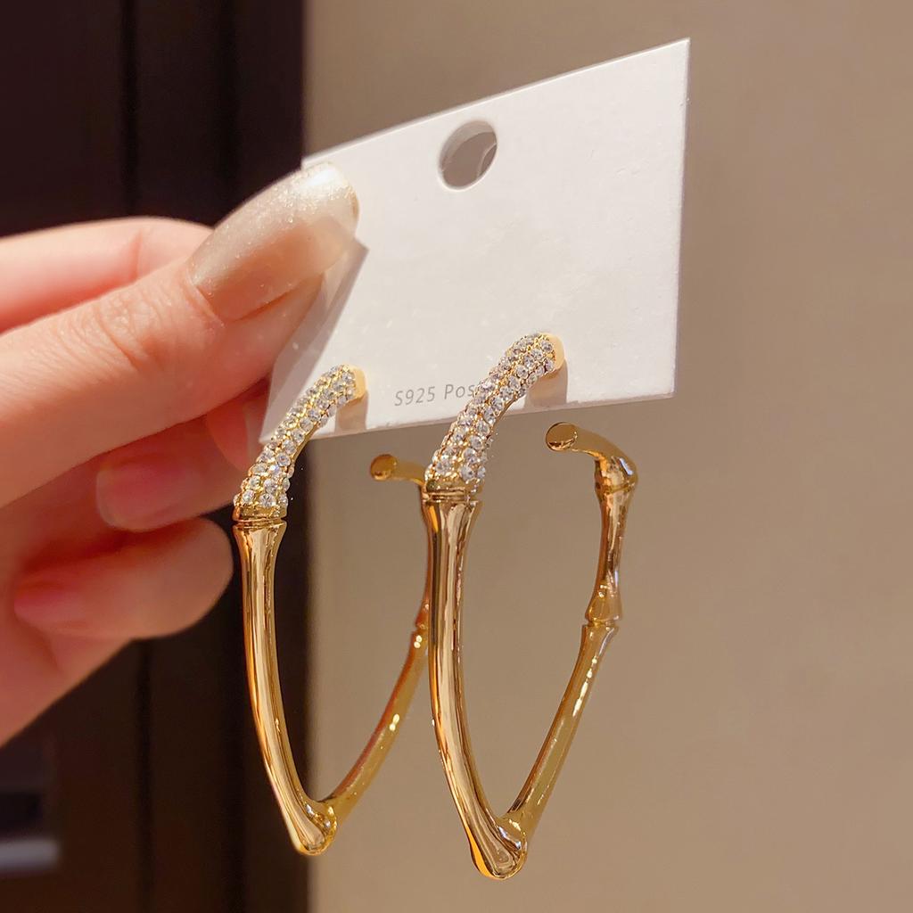 Diamond bamboo curved stud earrings light luxury niche design earrings earrings European and American exaggerated earrings women