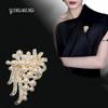 Luxury Women's Japanese & Korean Pearl Brooch with Rhinestones: Stylish Alloy Pin for Coats and Suits.