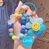 Smiley Face Sunflower Beaded Keychain Bracelet: 7-Color Design for Women & Couples, Bag Charm, Car Pendant Gift.