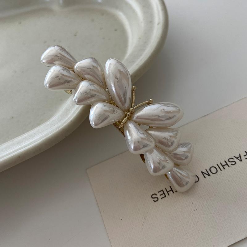 

Заколка-бабочка Элегантный изысканный жемчужный дизайн Край клипса Простой темперамент Высокий чувственный зажим для челки