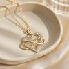 Zircon Heart Pendant Necklace with Smooth Figure-Eight Form, Polished Alloy Construction Neckchain, and Electroplated Finish