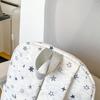 Star-Printed Backpack with Front Zipper Pocket and Tassel Details for School and Daily Use