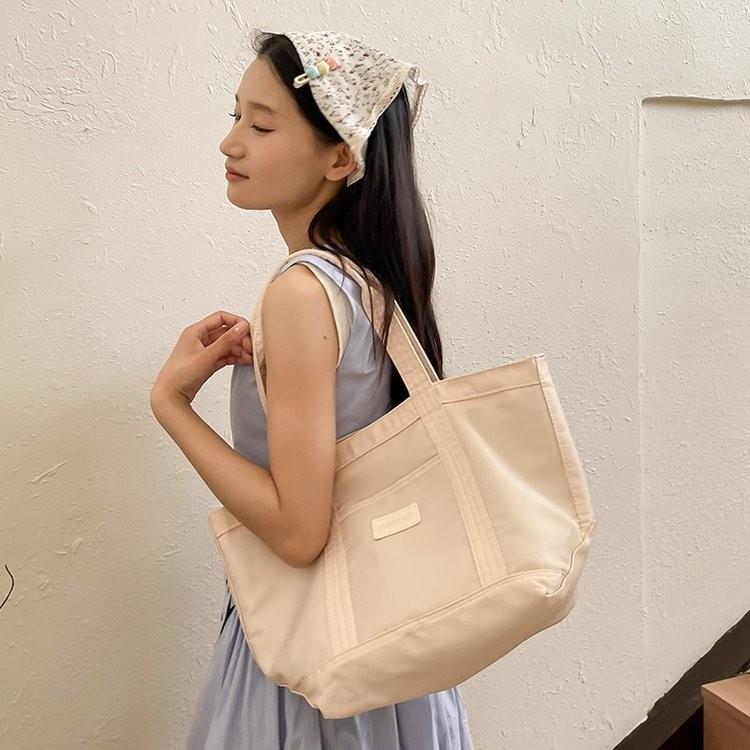 Spacious Nylon Canvas Tote Bag For Women Stylish Commuter Handheld Bag In Black And Cream