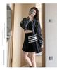 Wang Xinling High-Waisted Pleated Skirt: Short Front, Long Back, 4-Stripes, Slimming A-Line Mini Skirt.