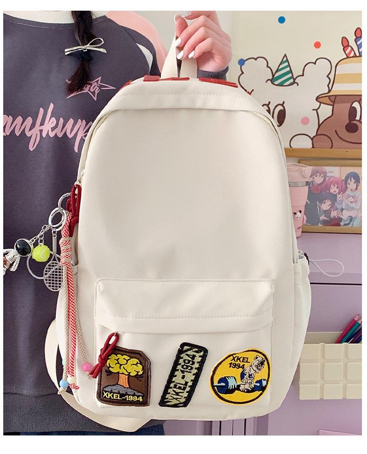 Schoolbag female Korean version ins style high value junior high school student high school student large capacity backpack 1011 new backpack male