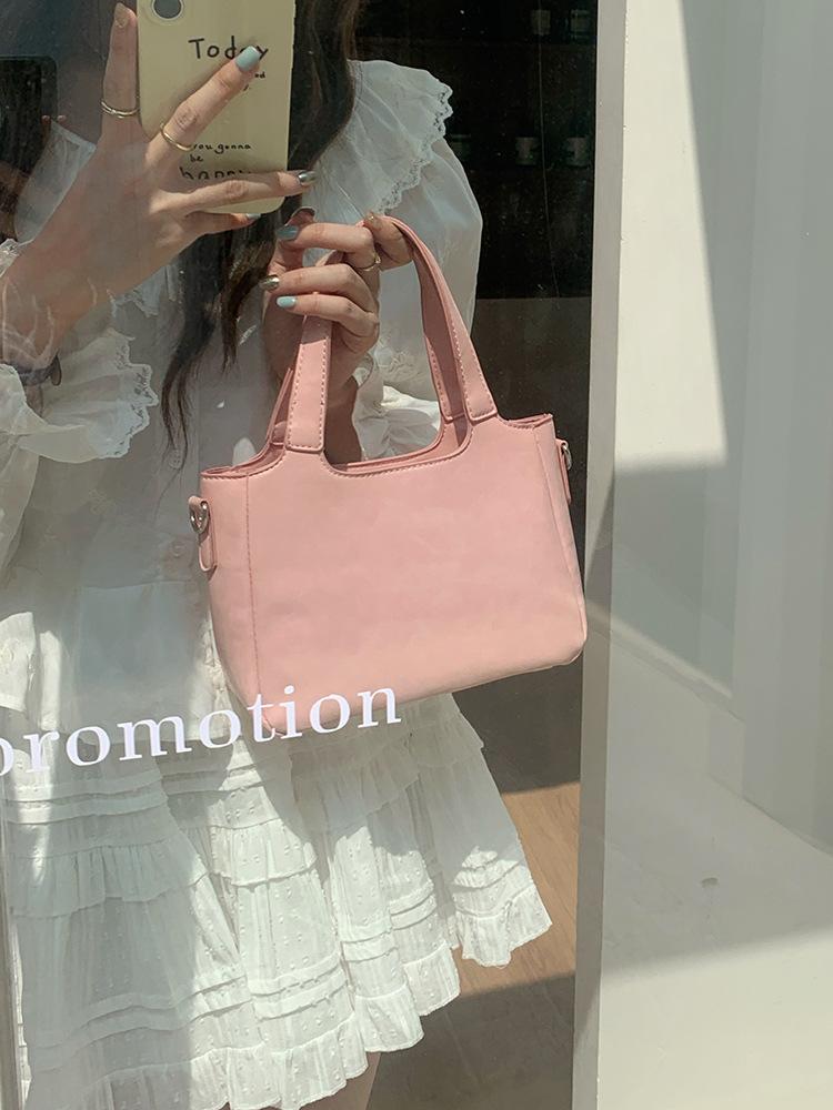 Summer fresh and simple bucket bag for women 2025 new solid color commuting shoulder bag, hand-held vegetable basket crossbody b