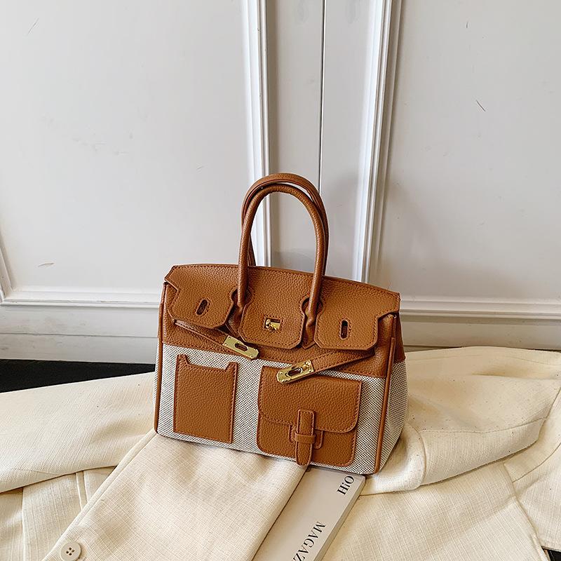 

Large capacity bag women s autumn and winter versatile 2025 new retro messenger bag casual portable commuter tote big bag