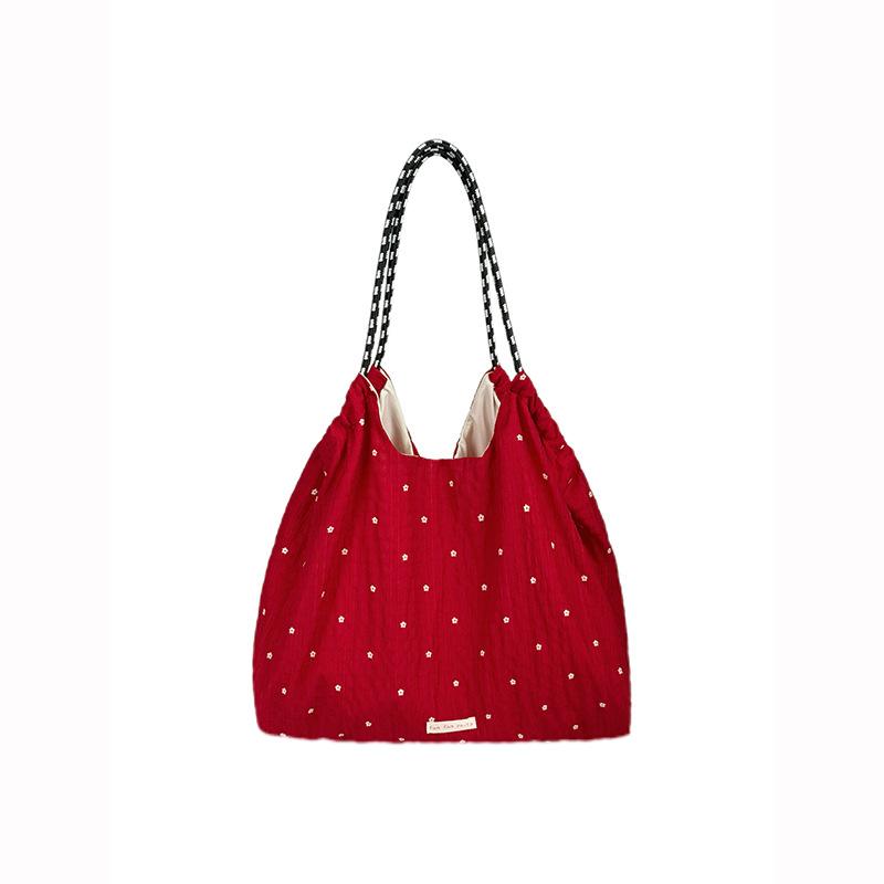 Korean large-capacity polka dot canvas bag, new lazy style commuter shoulder tote bag, niche versatile underarm bag