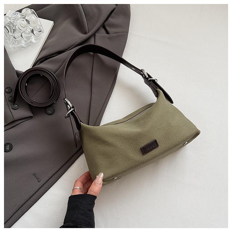 

This year s popular niche canvas bag women s 2025 new fashion versatile messenger bag super fire shoulder armpit bag tide