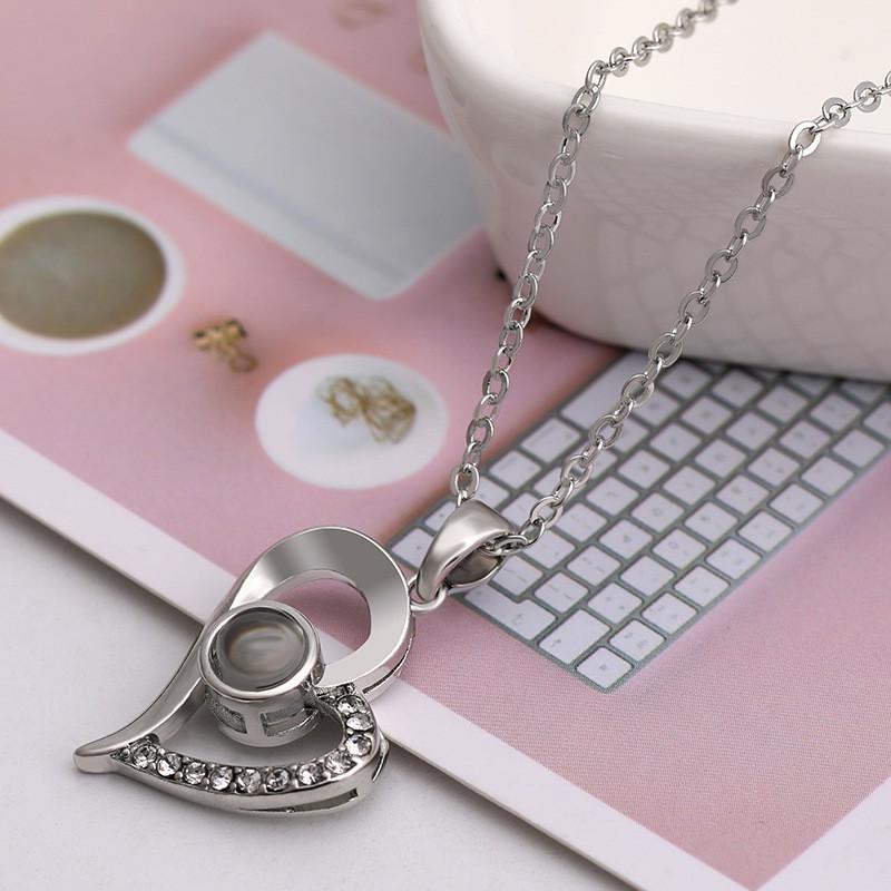 Heart Shaped Love Pendant Necklace Featuring I Love You Projection In 100 Languages