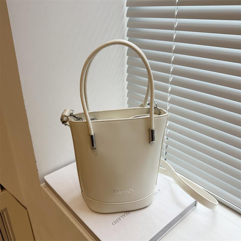 

Fashion solid color retro design new simple temperament commuter vertical hand carry shoulder crossbody small square bag білий