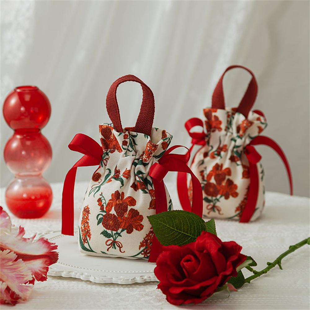 Retro Flower Handheld Candy Bags Wedding Gifts Packing Bags Portable Drawstring Candy Storage Bags Wholesale New 2024