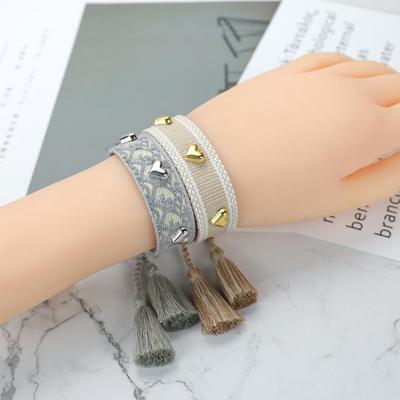 Silver Heart-Shaped Hand-Woven Tassel Bracelet - Ethnic Style Jewelry for Couples