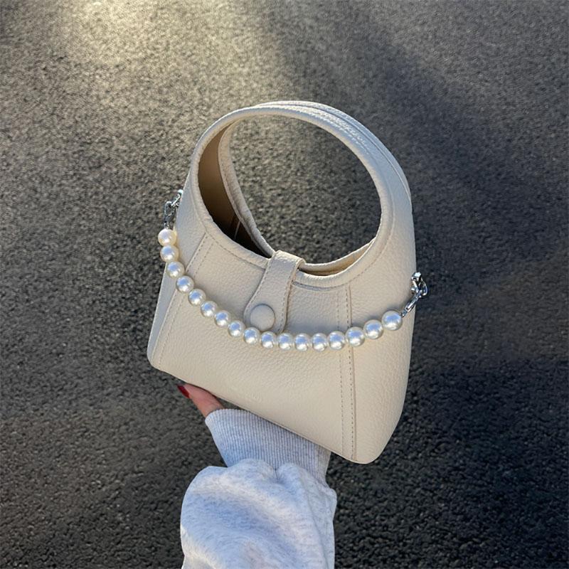 Mode Enfärgad Design PU Väska Högkvalitativ Känsla Pärlkedjor Bärbar Liten Hinkväska Dam Koreansk Version Pendlarhandväska