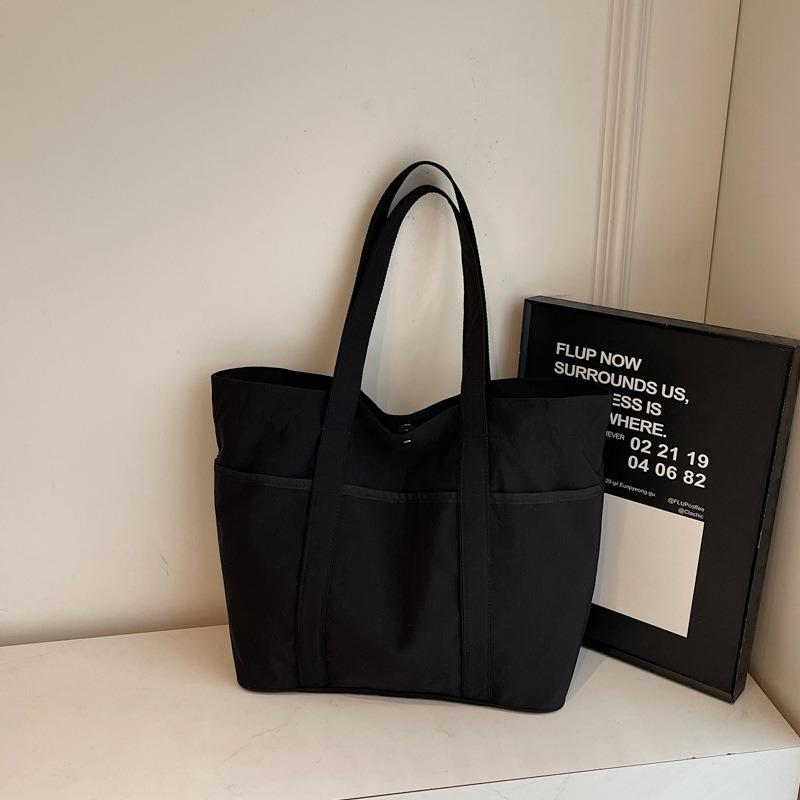 

New large-capacity bag women s simple shoulder bag casual handbag college students commuting tote bag чорний