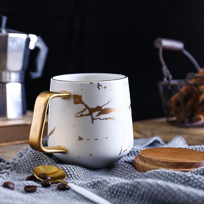 Japanese Ceramic Tea Cup: Matte Gold Marble & Black Pattern with Wooden Saucer