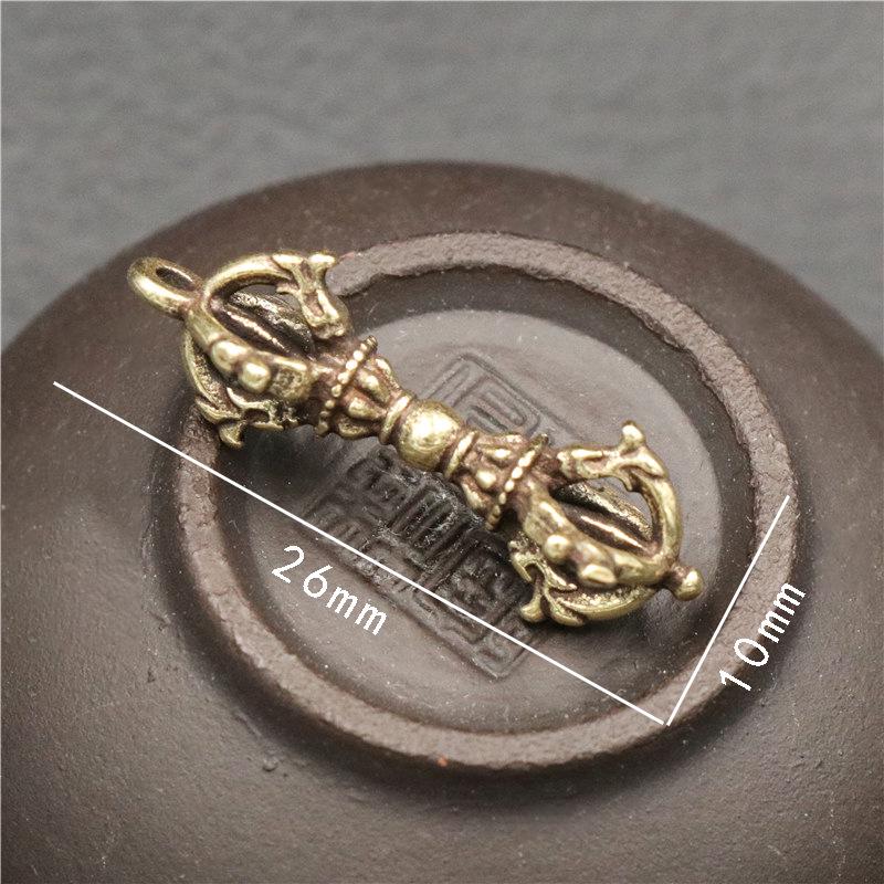 Messing Vajra Stößel Schlüsselanhänger: Goldener tantrischer Anhänger & kleines Ornament