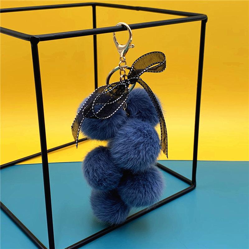 

Cute Creative Grape Fruit Lace Bow Fur Ball Plush Doll Toy Keychain Pendant Bag Hanging Backpack Charm Car Keyring New Year Gift синій