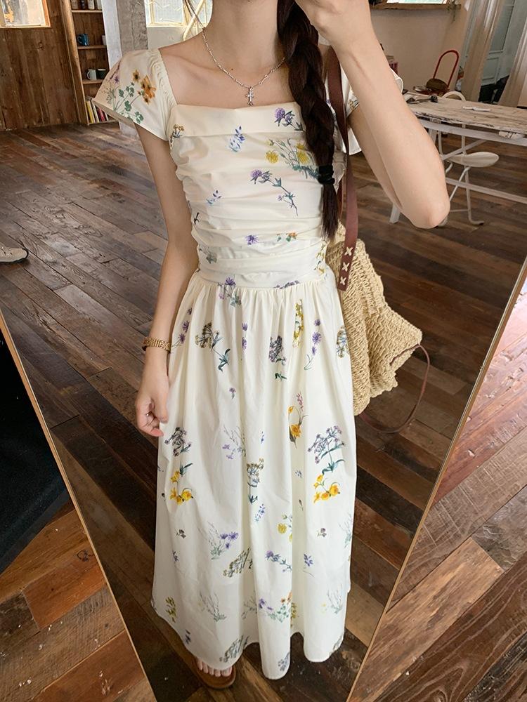Xiaofei Sleeve Square Neck Floral Dress Children's Summer 2026 New Seaside Vacation Coffee Break French Temperament Long Dress