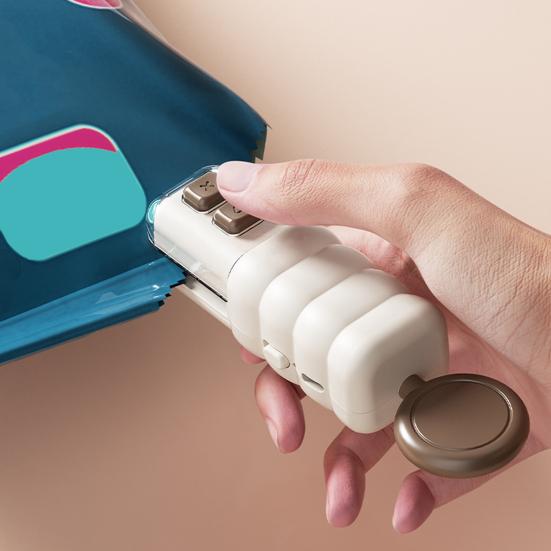 Mini förslutningsmaskin Magnetisk flasköppnare Kylskåpsmagnet Klämmor för förslutning av påsar för snacks och kryddor för matens färskhet