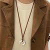 Brown Leather Cord Necklace with Silver Abstract Human Body Pendant – Autumn/Winter Light Luxury Clavicle Chain