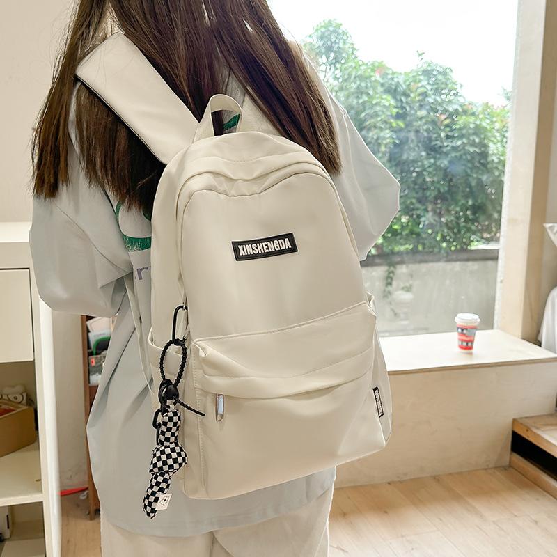 Elementary school bag, female junior high school student solid color backpack, high school student large capacity casual backpack fashion