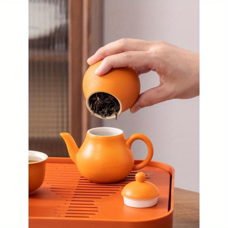 1 sada 6 kusů keramické cestovní čajové soupravy Lucky Orange Konvice a šálky Přenosná čajová souprava s podnosem a přenosným pouzdrem Ideální pro venkovní kempování a domácí použití Slavnostní