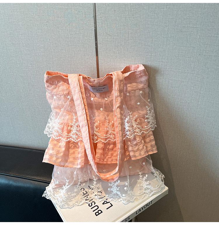 

Canvas bag women s large capacity 2025 new summer versatile shoulder bag casual pleated lace college bag розовый