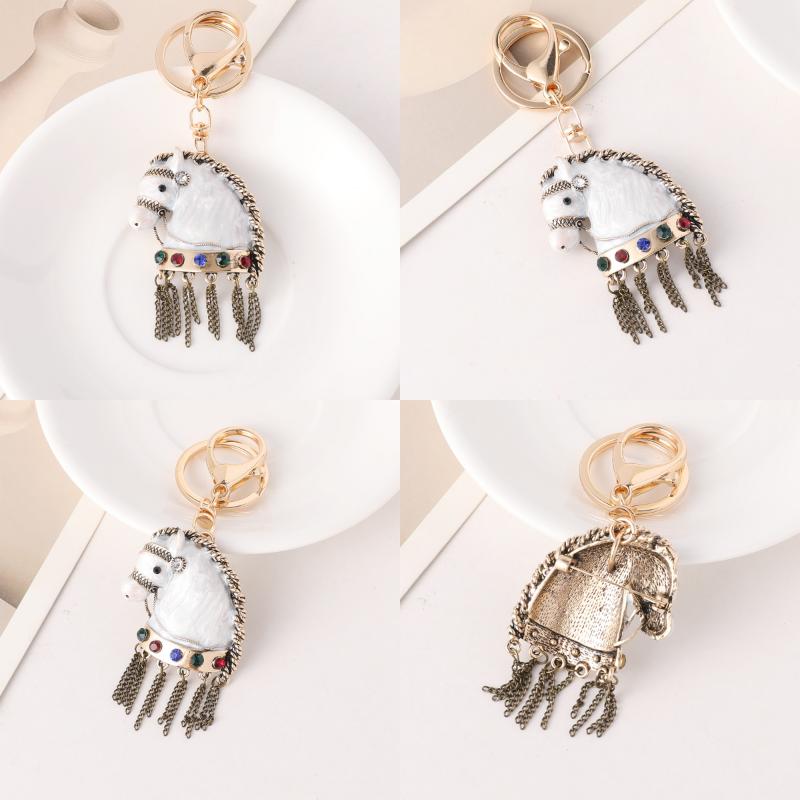 2026 New Horse Keychain Sparkling Crystal Metal Animal Pony Handbag Pendant Decoration Car Key Ring New Year Souvenir Gift