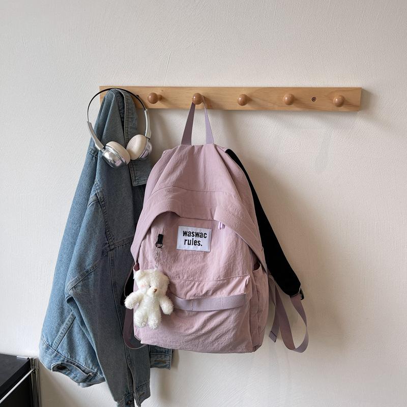Niche ins style schoolbag female college student Japanese casual large-capacity backpack junior high school student simple design backpack