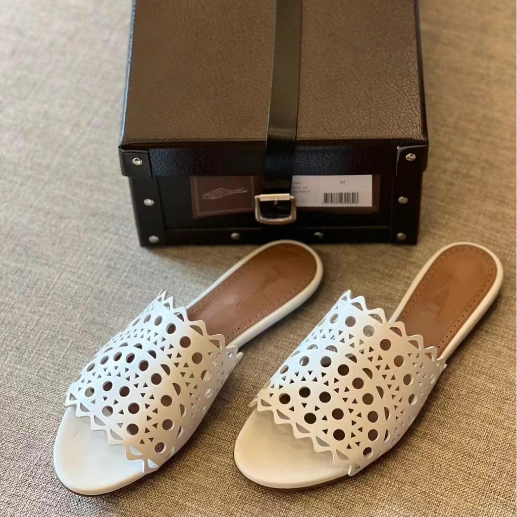 Leather Hollowed-out Laser Engraved Leather One-word Flat-bottomed Cool Slippers Women's Fashion 2025 New Summer Sandals