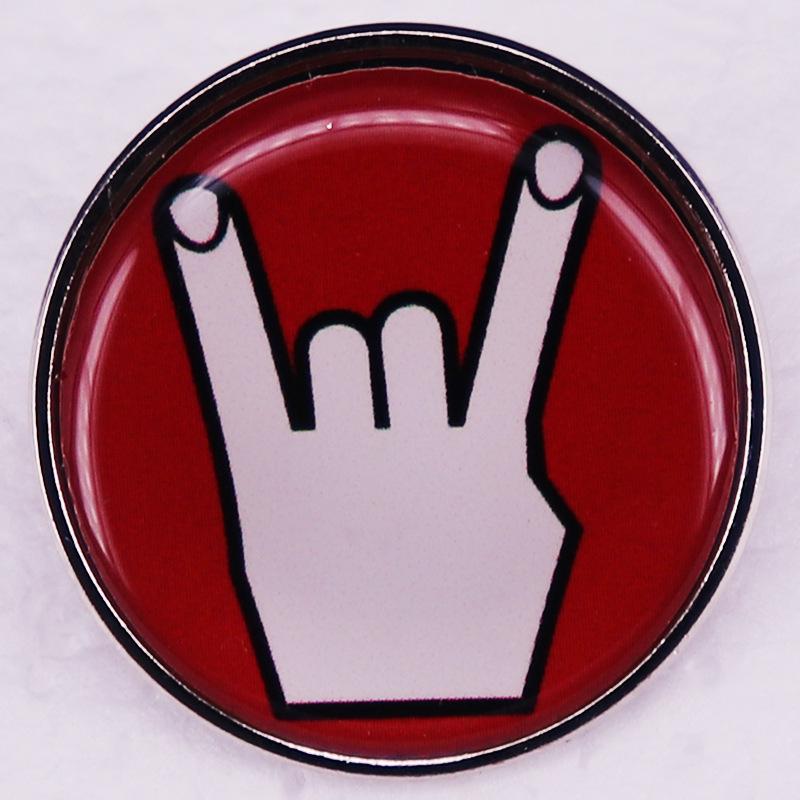 

Horn Fallen Mock Gesture Brooch