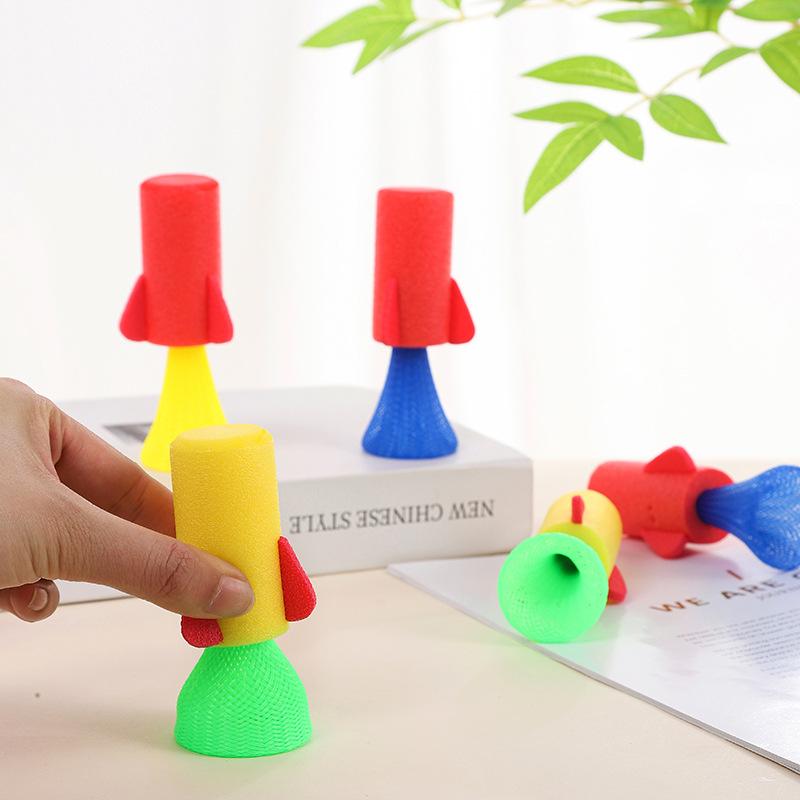Hüpfende Federraketen Spielzeug Eva Hüpfender Werfer Partygeschenke Pinata Füllungen Geburtstagsgeschenke Klassenzimmerpreise Goodie Füllungen Geschenk