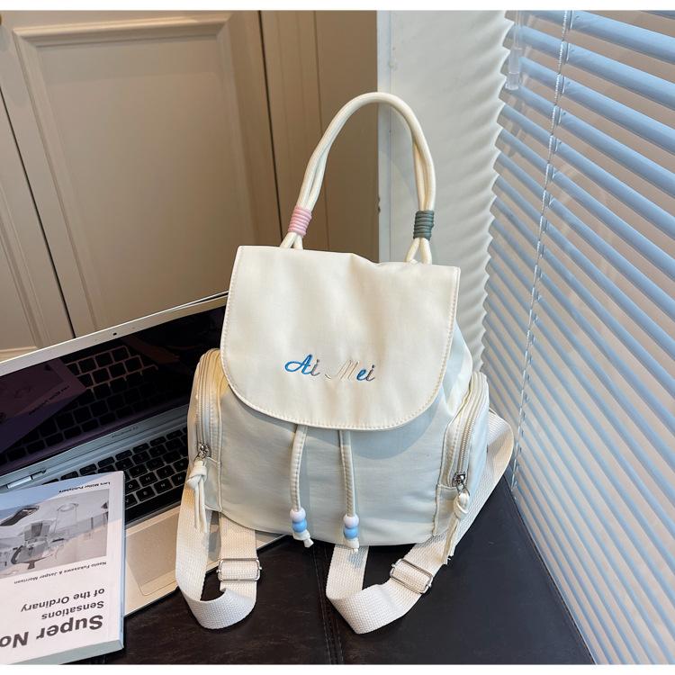 

South Korea ins leisure travel backpack women s 2025 new college student schoolbag lightweight versatile hand carry small backpack