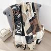 Camellia scarf fashionable versatile black and white contrasting colors air-conditioned room warm shawl travel sunscreen yarn