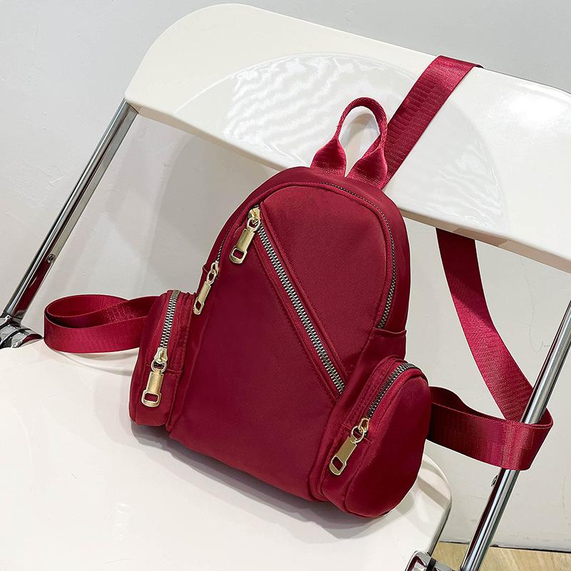 

Простой однотонный женский рюкзак, студенческая сумка в стиле ретро с множеством карманов, многоцелевой рюкзак из ткани Оксфорд. красный