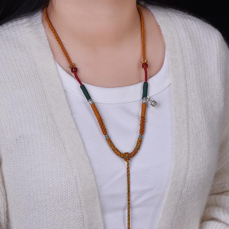 Tibetan Silver Cotton Necklace with Ethnic Cow Bone Thangka Pendant