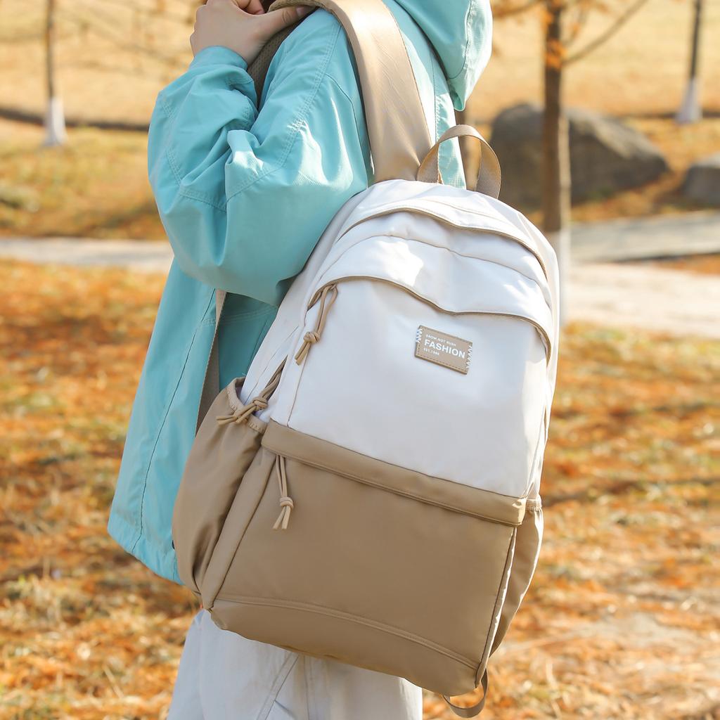 Schoolbag Men's trendy brand wear-resistant casual backpack large capacity junior high school student weight loss spine bag high school student Korean