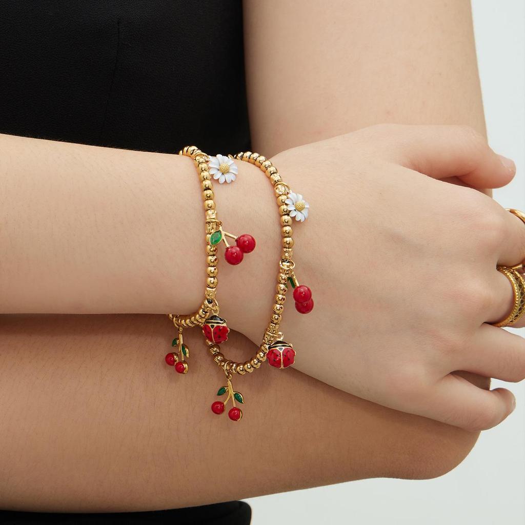 Two-Tone 18K Gold-Filled Stainless Steel Cherry Daisy Pendant Bracelet