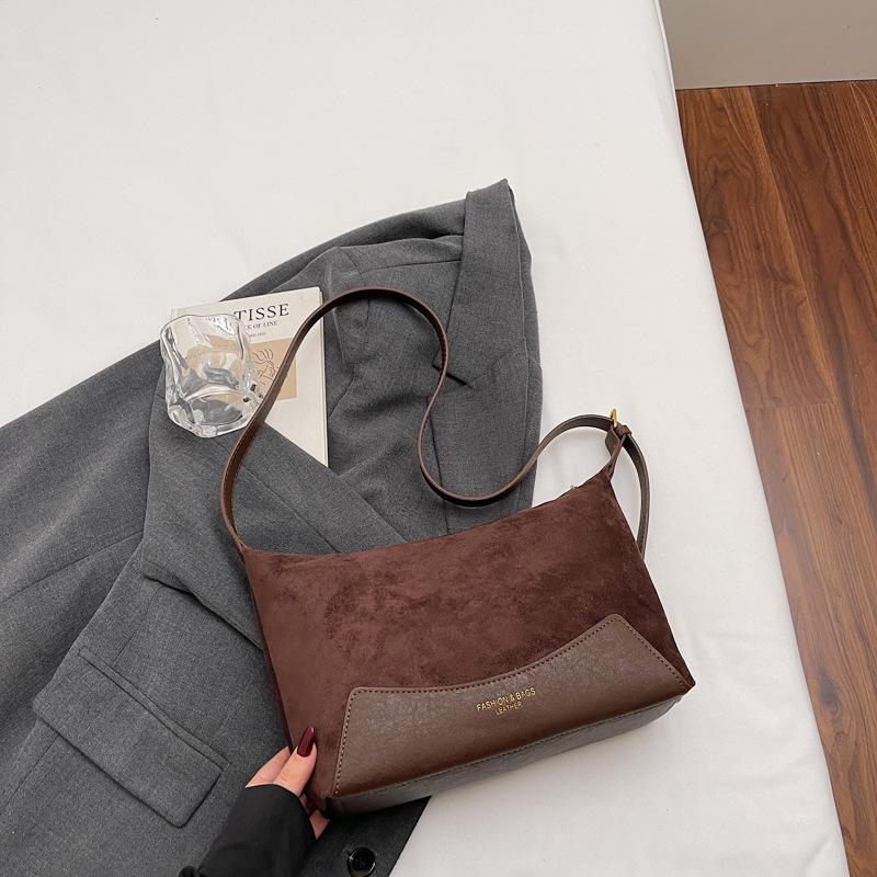 

Корейская версия популярной леопардовой сумки-багета большой вместимости 2025 новая осенняя сумка через плечо нишевая通勤 сумка-тоут