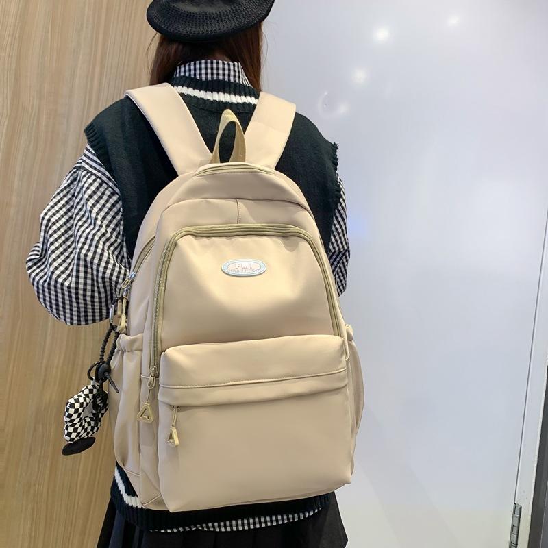 

School bag for middle school students and junior high school students New college students Simple and versatile multi-layer niche design Burden хаки