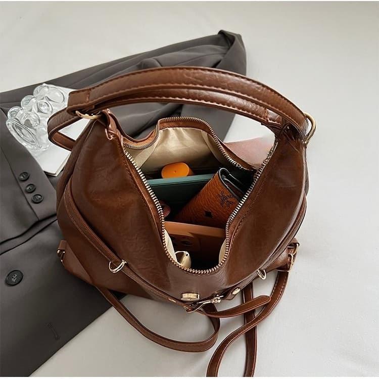 Portable casual handbag for short trips with one shoulder