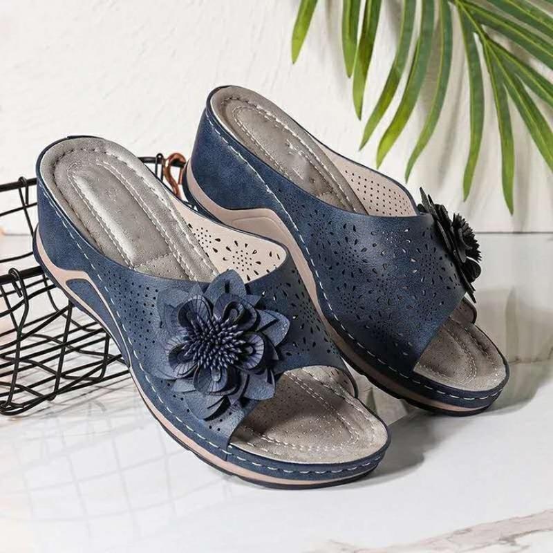 Large size slope heel slippers women's summer new hollow flower flat bottom one-word cool slippers beach women's shoes